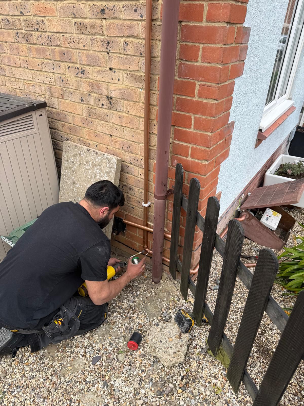 DSP plumber soldering external copper pipework
