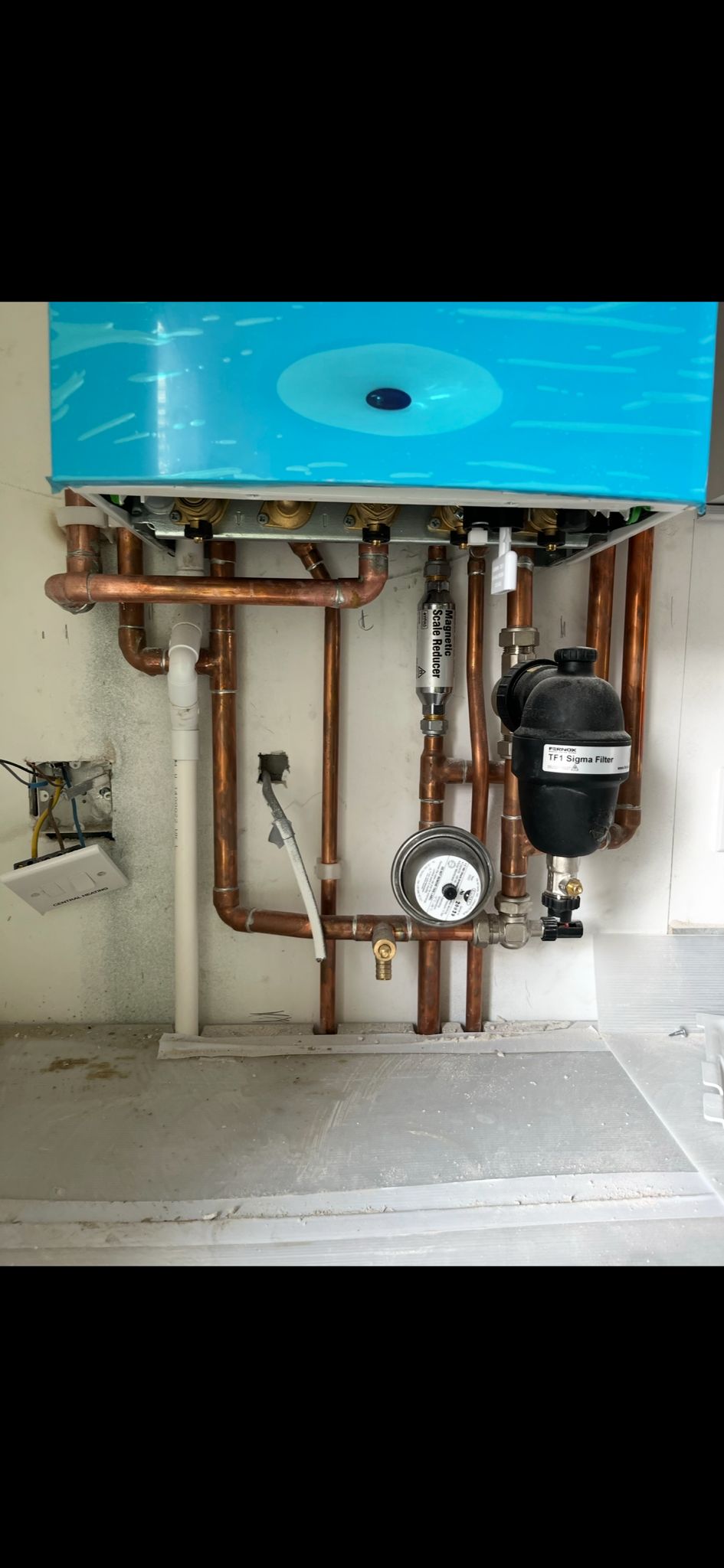 Boiler install with magnetic filter and scale reducer